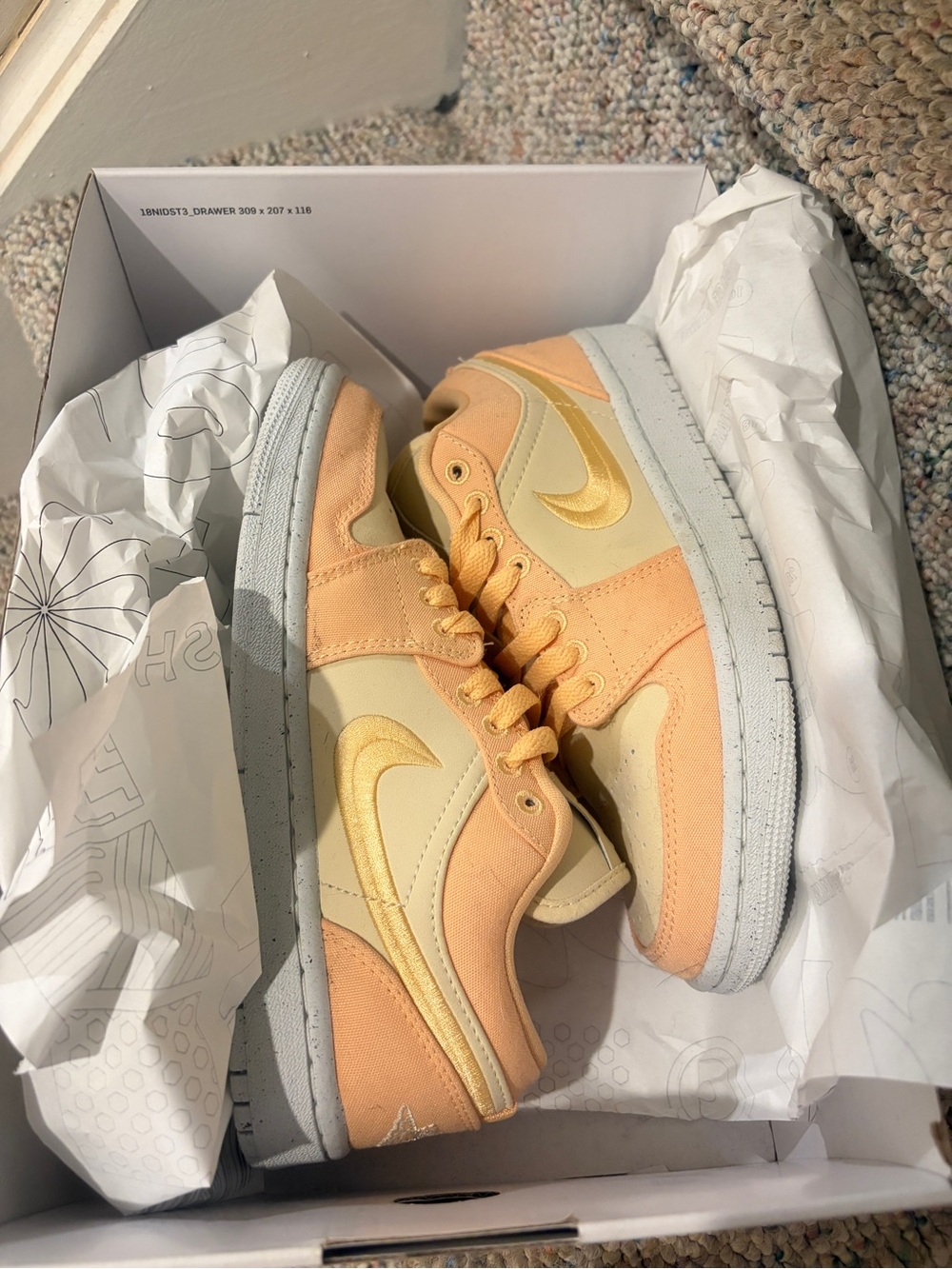 Women’s Nike Dunks Low-Top Sneakers in Peach and Pale Yellow
